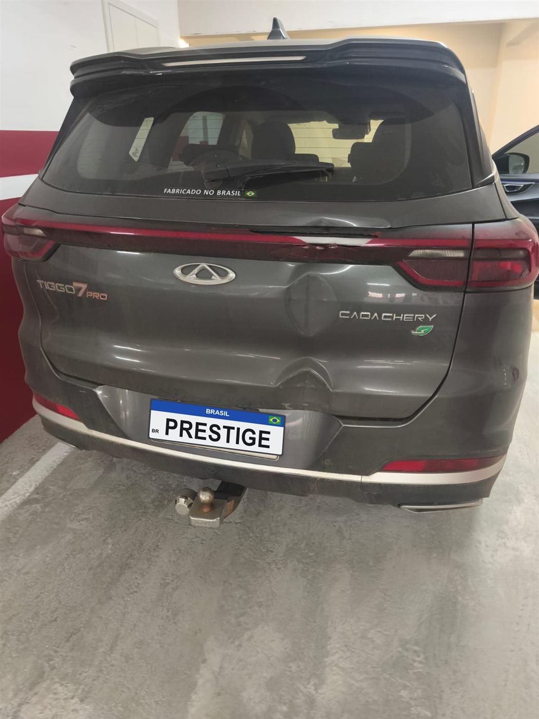 Chery Tiggo 7 Pro com amassados na traseira